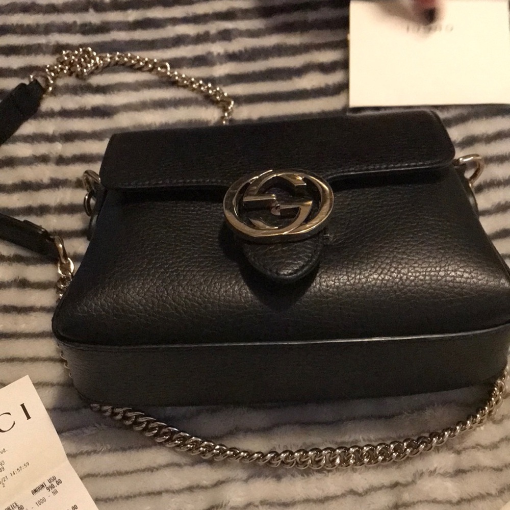 Black leather Gucci purse. Brand new used  2x. I have receipt I paid $990